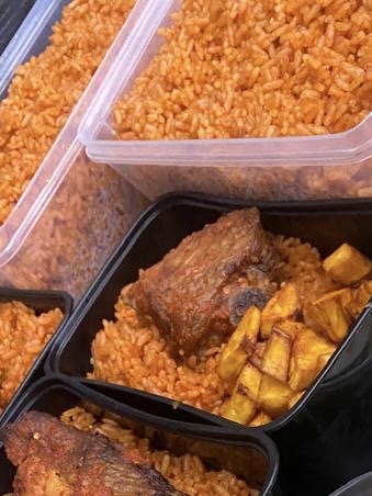 Smokey jollof rice / per spoon